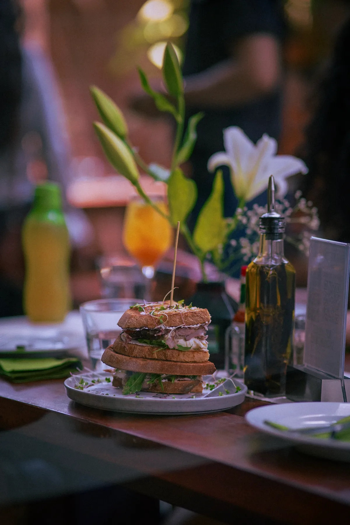 Burger and drinks on a dining table